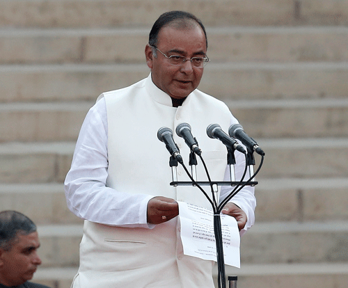 New Finance and Corporate Affairs Minister Arun Jaitley today pledged to contain price rise, restore confidence of investors in the economy and promote growth while keeping the fiscal deficit under check. Reuters