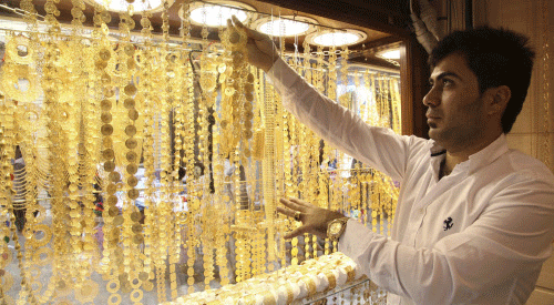 Continuing its losing streak for the second straight day, gold prices today fell by Rs 170 to trade at a fresh 10-month low of Rs 28,100 per ten gram in the national capital on increased selling by stockists. Reuters photo