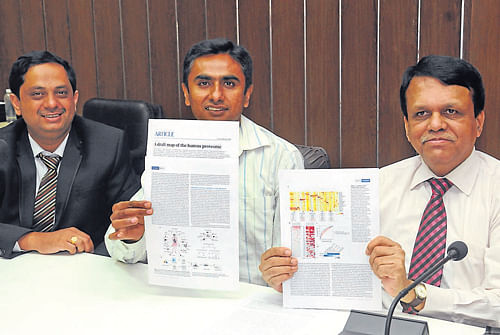 Nimhans Director Dr Satish Chandra (extreme right) at a press conference in the City on Wednesday. Institute of Bioinformatics faculty scientists T S Keshava Prasad (left) and Dr Harsha Gowda are with him. dh photo