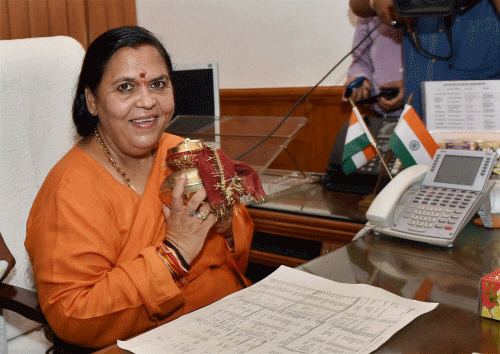 ma Bharti takes charge as the Union Minister for Water Resources, River Development and Ganga Rejuvenation in New Delhi on Wednesday. PTI Photo