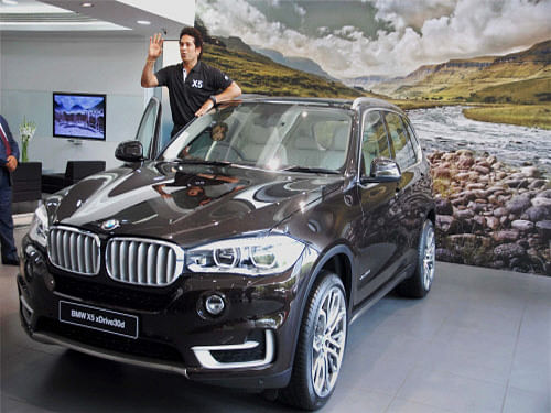 The 3-litre diesel machine was unveiled by Sachin Tendulkar, who is also BMW India's brand ambassador. The cricket icon said he has been using the first generation X5 since 2002. PTI photo