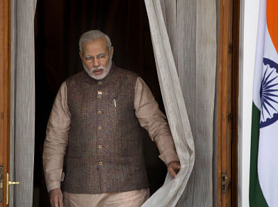 Prime Minister Narendra Modi's disapproval of living individuals becoming part of the curriculum today prompted governments in BJP-ruled Gujarat and Madhya Pradesh to drop the plan to include his life story in the school syllabi. AP photo