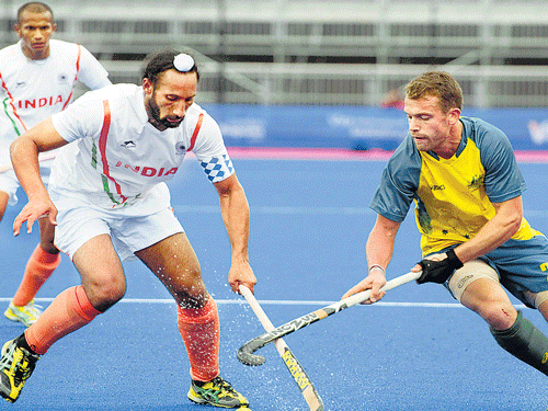 Midfield maestro Sardar Singh's (left) form will be crucial to India's chances at the Hockey World Cup. file photo