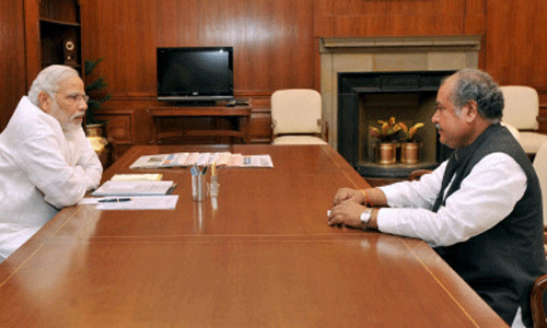 Prime Minister Narendra Modi at a meeting with Union Minister for Mines, Steel and Labour & Employment, Narendra Singh Tomar in New Delhi on Friday. PTI Photo