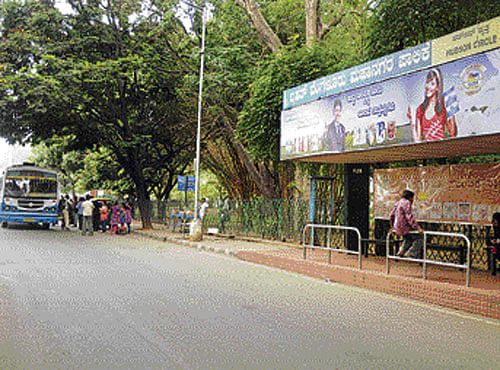 Bus stop woes are city-wide, pushing commuters to a tough corner. Here's a glimpse of such bus shelters or the lack of it across the city. DH photo