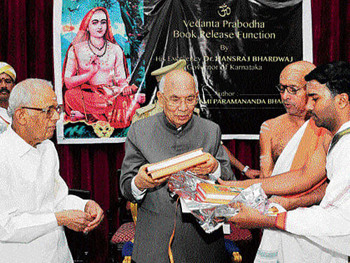 Governor H R Bhardwaj released the English version of the Sanskrit book 'Vedanta Prabodha,' authored by Paramananda Bharathi Swami in the City on Sunday. The book gives an in-depth insight into the Advaita philosophy.  DH photo