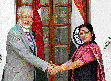 External Affairs Minister Sushma Swaraj and her Omani counterpart Yousuf bin Alawi bin Abdullah shake hands before a meeting in New Delhi on Tuesday. PTI