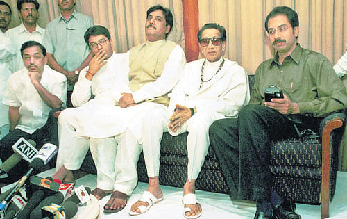 A file photo of Union minister Gopinath Munde with the Sena leaders Balasaheb Thackeray, Uddhav Thackeray and Raj Thackeray. PTI