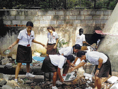 Conscious lot: Students of Sophia High School practising the 'Divide and Dump' policy  on campus.