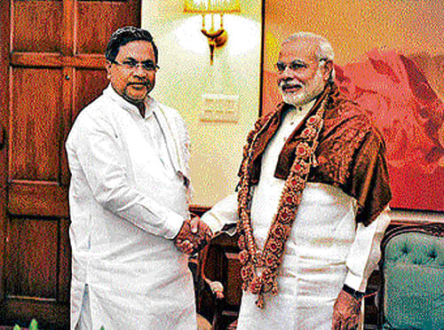 Prime Minister Narendra Modi on Wednesday promised Chief Minister Siddaramaiah that the Centre will consider convening a meeting of chief ministers to take their views on amending the Constitution to make mother tongue the compulsory medium of instruction in primary schools. DH photo