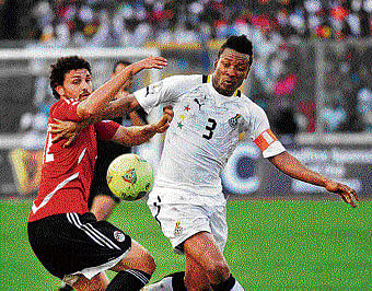 Asamoah Gyan (right) missed a crucial penalty in 2010 and will be keen to atone for that this time. AP