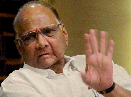 NCP chief Sharad Pawar today asked Prime Minister Narendra Modi to initiate a CBI probe into the death of former Rural Development Minister Gopinath Munde to bring out the 'facts' and assuage the feelings of the BJP leader's supporters. / PTI Photo