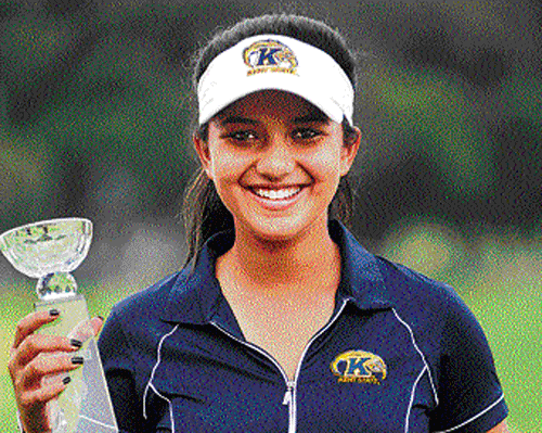 that winning smile: Raksha Phadke poses with the  trophy at the KGA on Thursday. dh photo