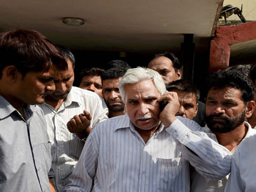 Ravindra Singh, father of MBA student Ranbir Singh who was killed in a fake encounter in Dehradun in July 2009, talking to media at Tis Hazari court in New Delhi. The CBI Saturday asked a court here to award the death penalty to seven Uttarakhand policemen. PTI Photo