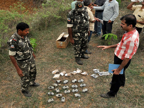 The National Investigation Agency (NIA) on Saturday recovered 18 live bombs in Ranchi after two people detained in connection with the Patna serial blasts gave away the location of the explosives. PTI photo