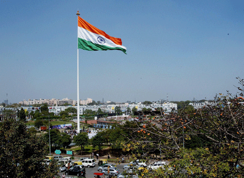 A national flag, measuring 90 feet in length, 60 feet in width and weighing 35 kilograms, that was hoisted at the Central Park, Connaught Place in New Delhi on Friday. The flag is being claimed as largest and the flagpole as highest in the country. PTI Photo