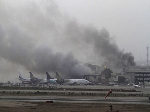 Smoke rises after militants launch an early morning assault at Jinnah International Airport in Karachi. Reuters photo