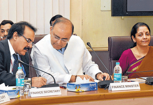 Union Finance Minister Arun Jaitley with Minister of State for Finance Nirmala Sitharaman and Finance Secretary Arvind Mayaram during a pre-Budget meeting with banking and financial institutions in New Delhi on Tuesday. PTI