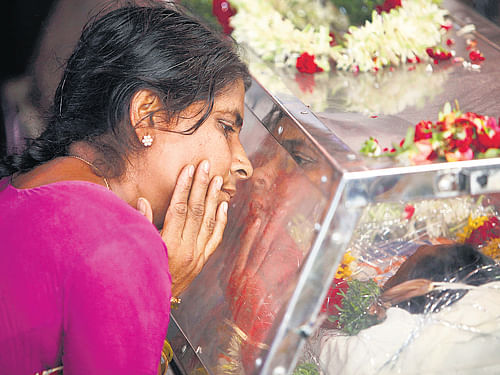 Mother of Gampala Aishwarya, one of the students who died in t he Beas river tragedy, mourns during her funeral at their residence in Hyderabad