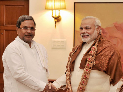 A delegation led by Karnataka Chief Minister Siddaramaiah met the prime minister here at his Parliament office, Modi reportedly said that the NDA government has never taken any decision to set up the CMB and that wrong information has  appeared in the media. PTI photo