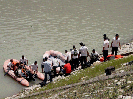 Rescue teams today fished out the body of a student from the Beas River and intensified the hunt for 19 others missing even as a case of negligence has been registered against authorities of the Larji Hydropower project in connection with the incident. PTI photo