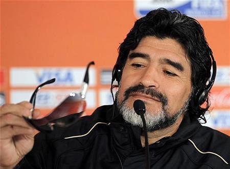 Football legend Diego Maradona has expressed confidence that Brazilian President Dilma Rousseff will be able to settle the strikes in her country ahead of the start of the FIFA World Cup in Sao Paulo Thursday. Reuters photo