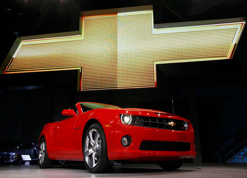 n this Wednesday, Nov. 17, 2010, file photo, the 2011 Chevrolet Camaro convertible debuts at the Los Angeles Auto Show. General Motors is recalling nearly 512,000 Chevrolet Camaro muscle cars from the 2010 to 2014 model years. A driver's knee can bump the key and knock the switch out of the 'run' position, causing an engine stall. (AP Photo)