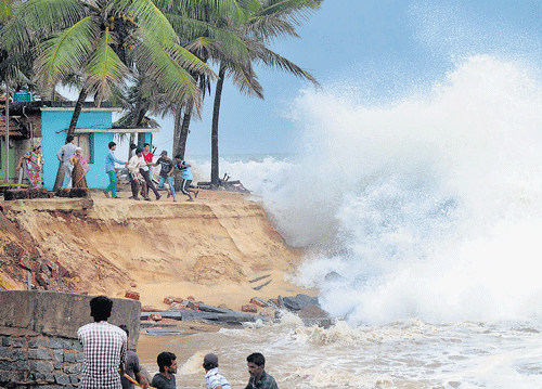 danger bay: Houses along the seashore were damaged due sea erosion near Ullal in Dakshina Kannada district on Friday. kpn
