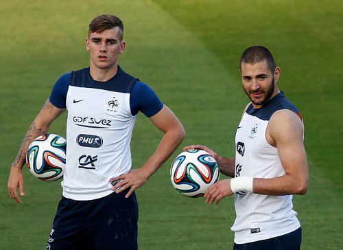 bonding time France's Karim Benzema (right) and Antoine Griezmann during a training  session on Friday. reuters