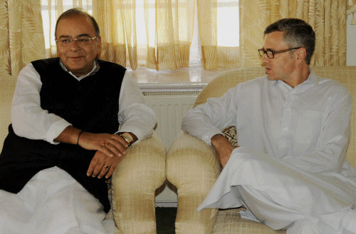 efence Minister Arun Jaitley with Chief Minister of Jammu and Kashmir Omar Abdullah during their meeting at his residence in Srinagar. PTI photo