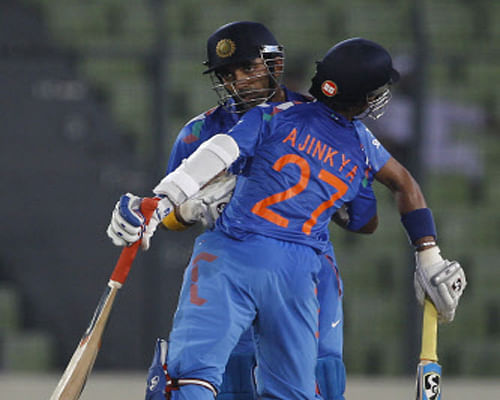 Ajinkya Rahane anchored his innings to perfection in the company of comeback man Robin Uthappa and guided India to a comfortable seven-wicket victory in a rain-truncated first ODI against Bangladesh here today. AP photo