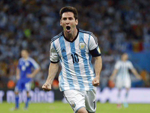 Argentina's Lionel Messi celebrates scoring his side's second goal during the group F World Cup soccer match between Argentina and Bosnia at the Maracana Stadium in Rio de Janeiro, Brazil. AP photo