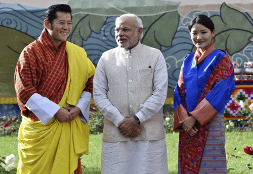 Prime Minister Narendra Modi, stands with Bhutan's King Jigme Khesar Namgyel Wangchuck, left and Queen Jetsun Pema, right, during a ceremonial reception at Royal Palace in Thimphu, Bhutan. Ap photo