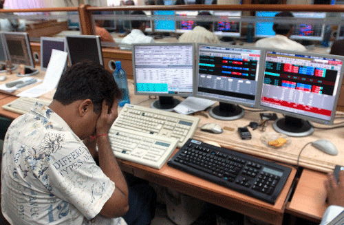 The benchmark BSE Sensex plunged 104 points in morning trade today on persistent selling on the back of weak Asian cues amid an escalating violence in Iraq. PTI file photo