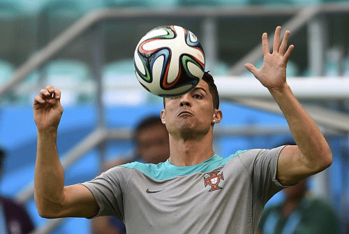 Portugal's Cristiano Ronaldo controls the ball during their 2014 World Cup team training session at the Fonte Nova arena in Salvador. Reuters photo
