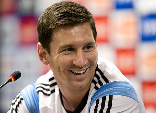 Argentina's Lionel Messi listens to a question at a news conference after a training session in Vespasiano, near Belo Horizonte, Brazil, Monday, June 16, 2014. Argentina plays in group F of the 2014 soccer World Cup. AP