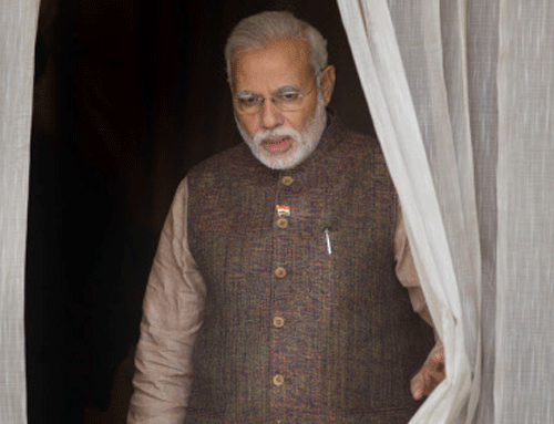 The BJP had extensively used the catchphrase to mobilise support for a ''Modi Sarkar'' at the Centre. AP File Photo