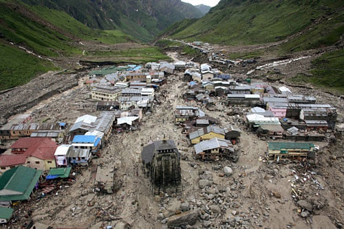 The temple town of Kedarnath faced the worst brunt in the Himalayan tsunami a year ago. The town, with giant boulders, half collapsed buildings, lies in a ravaged state. PTI file photo