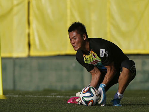 Japan's goalkeeper Eiji Kawashima said that the 'Blue Samurais' will attack Greece in their Group C World Cup clash in the city of Natal, Thursday. Reuters photo
