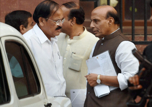 Home Minister Rajnath Singh and Parliamentary Affairs Minister M Venkaiah Naidu after a Cabinet meeting at PMO in New Delhi. PTI Photo