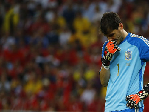 Spain captain Iker Casillas has apologised to fans saying that his team was responsible for their elimination from the FIFA World Cup after their 0-2 loss to Chile Wednesday. Reuters photo