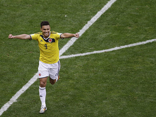 Teofilo Gutierrez faced two challenges before the World Cup started: try and make Colombia forget the absence of Radamel Falcao and break the curse of the number nine. AP file photo