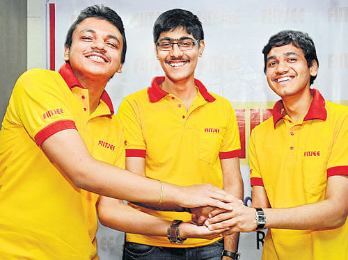 Achievers: JEE all India 78th rank holder Saurabh Pinjani flanked by 221st rank holder Manish Singh (left) and 266th rank holder Shreyan Gupta (right) in Bangalore on Thursday. dh photo