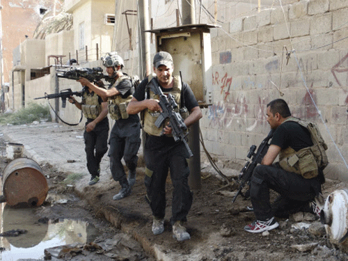 Members of the Iraqi Special Operations Forces take their positions during clashes with the al Qaeda-linked Islamic State of Iraq and the Levant (ISIL) in the city of Ramadi. All the Indians abducted in Iraq are safe but one has escaped from the custody of Sunni insurgents, the government said Friday. Reuters photo