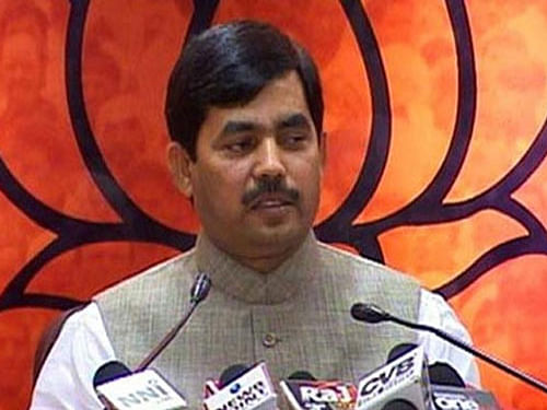 'Hindi is not being imposed on a non-Hindi state. What objection is there if we work in Hindi,' BJP spokesperson Shahnawaz Hussain told reporters here. PTI file photo