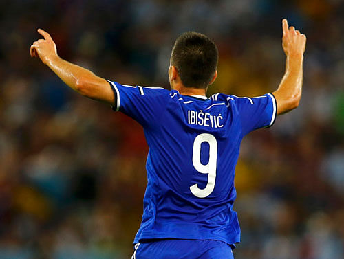Bosnia's Vedad Ibisevic celebrates his goal during the 2014 World Cup Group F soccer match between Argentina and Bosnia at the Maracana. For Bosnia, a victory at the World Cup finals would be another first with African champions Nigeria in their sights at the Pantanal arena in Group F on Saturday. Reuters