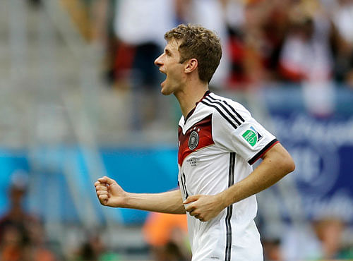 raising the bar: Thomas Mueller, with three goals in his opening game, would be  determined to add some more to his tally when Germany take on Ghana on Saturday. AP