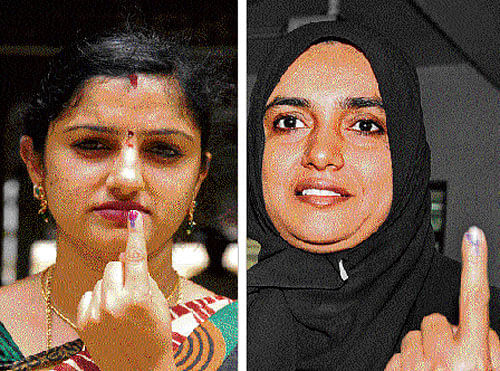 we did it: Voters show their inked fingers after casting their votes in the elections to the teachers' and graduates' constituencies in Bangalore on Friday. dh Photos