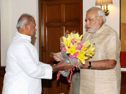 Bihar Chief Minister Jitan Ram Manjhi today met Prime Minister Narendra Modi during which the issue of special category status to the state figured prominently. PTI photo