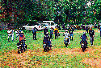 Motorbike riders from various clubs participate in slow motorcycle race organised as a part of 'Boot Camp,' at KACES ground in Balmatta, in Mangalore, on Sunday. DH photo